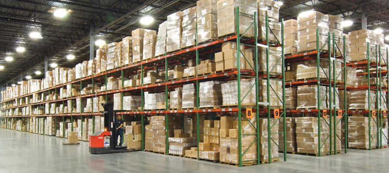 Pallet rack rows and working warehouse aisles